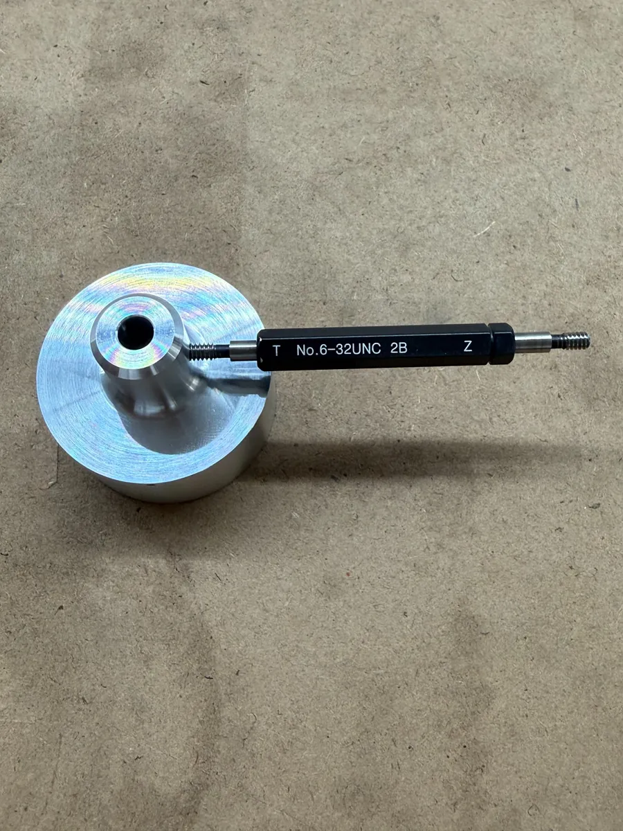 6-32 UNC-2B thread plug gauge inspection on the aluminum housing