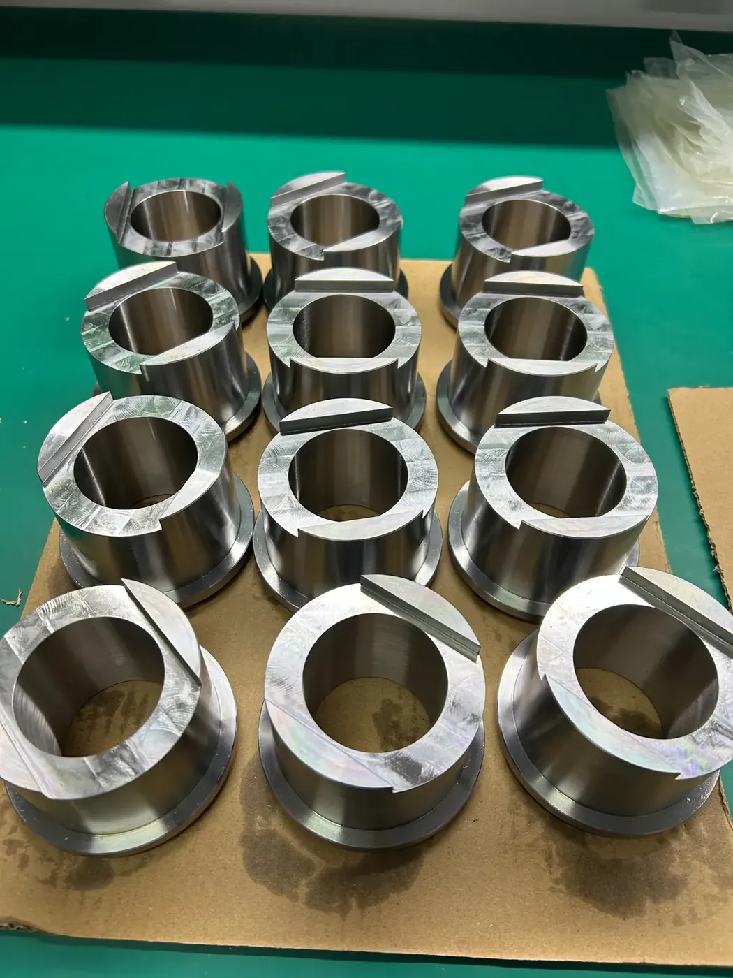 Press-Fit Bushing Assemblies for Excavator Attachments