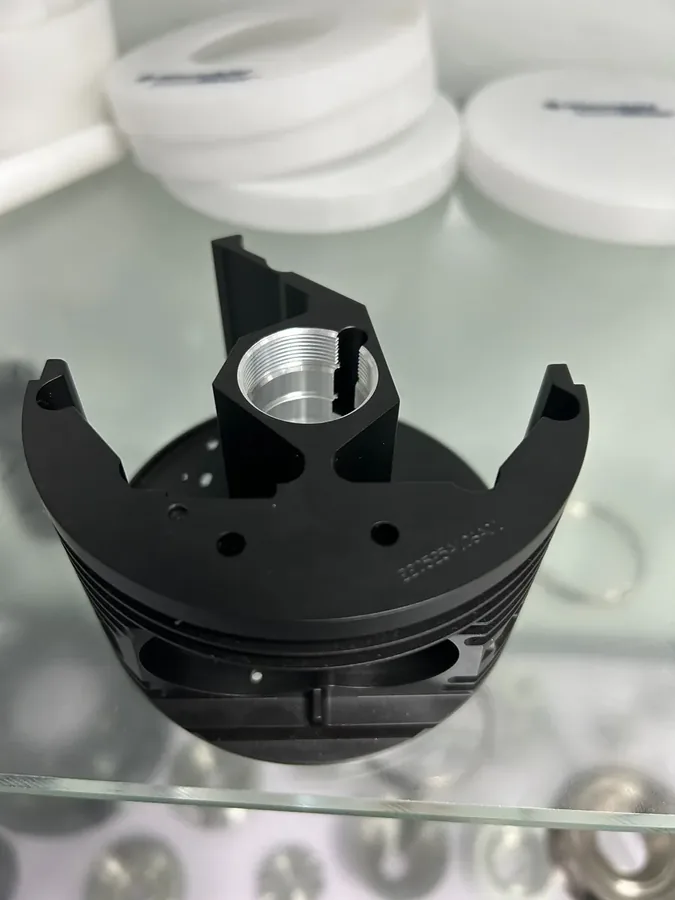 Black anodized machined aluminum component