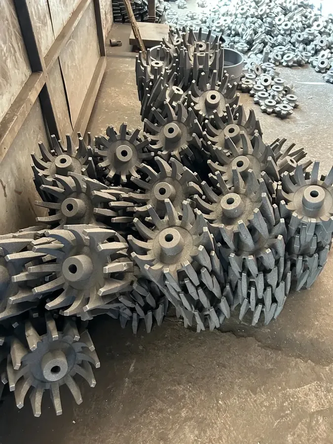 Batch of raw cast iron impeller components