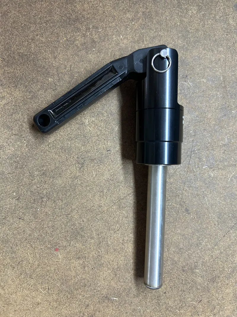Custom pressure-test fixture installed on the stainless steel tube